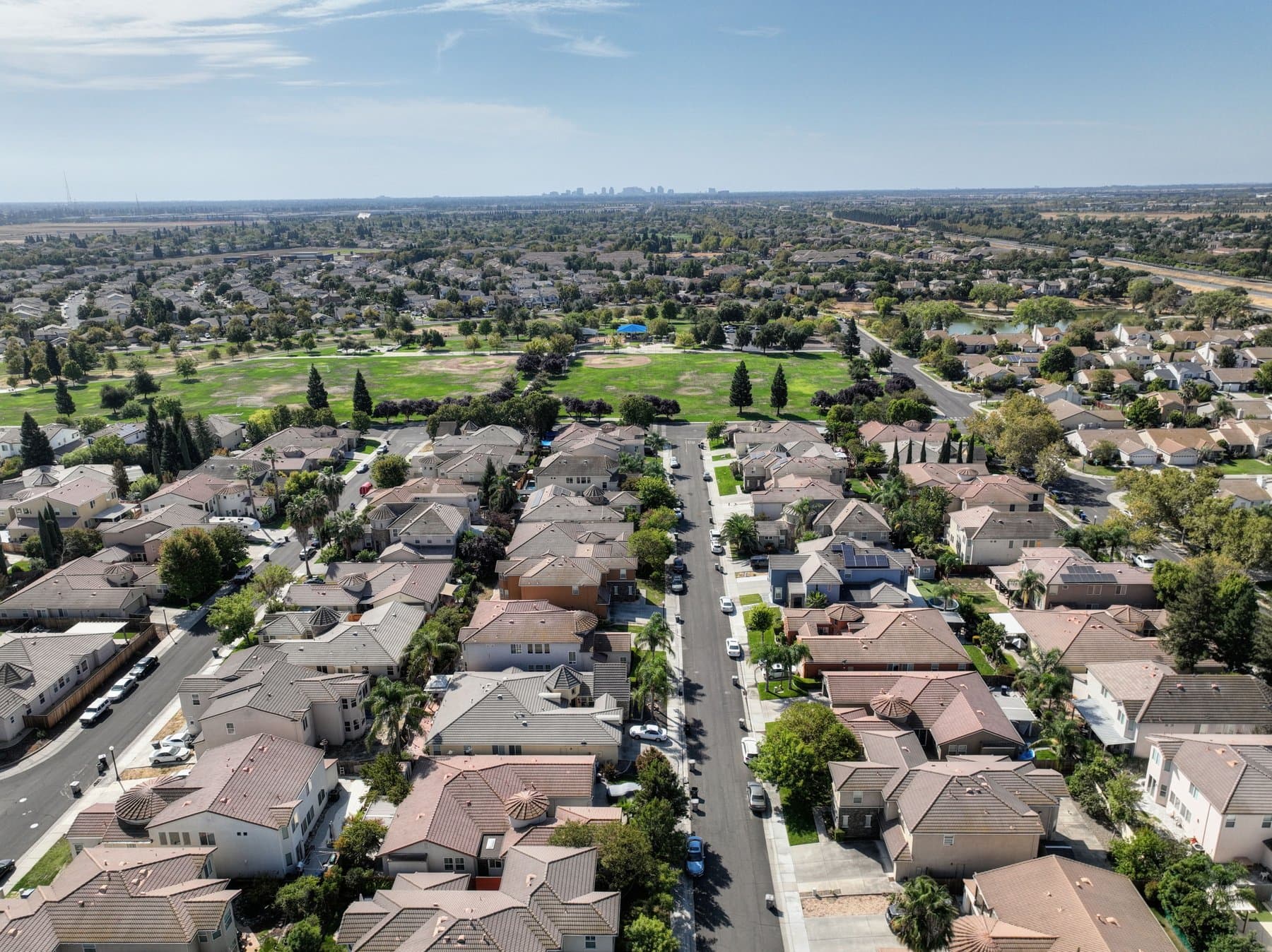 Aerial view of a suburban Hamilton County neighborhood with terracotta rooftops